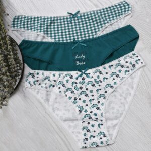 A stylish set of women's panties featuring checkered, floral, and solid green patterns with lace detail.